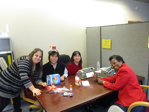 Everyone is enjoying the party at the Braille table